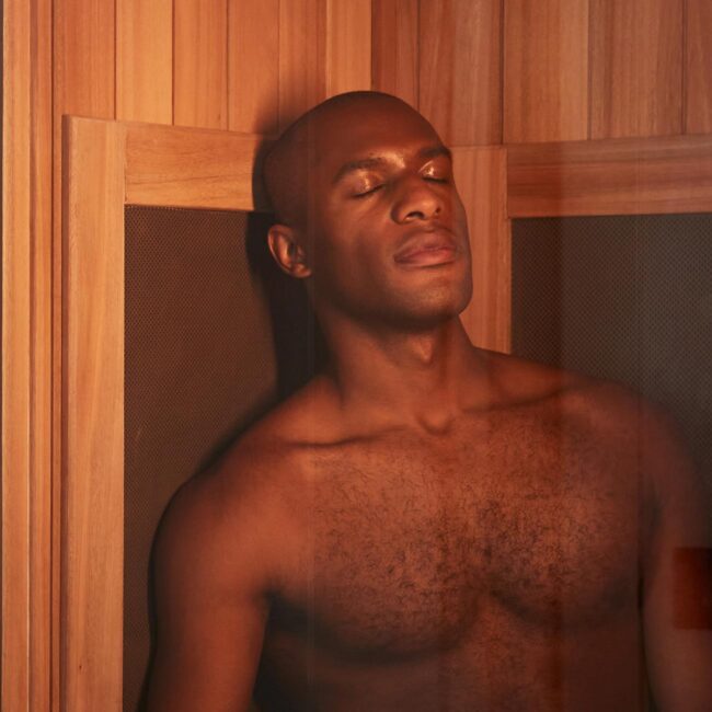 Man relaxing in an infrared sauna